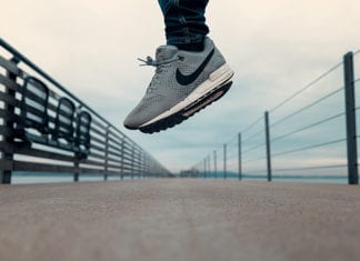 Jumping in the air wearing shoes