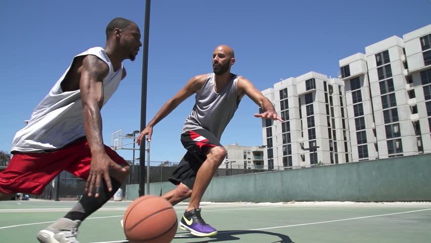 players playing outdoor basket ball